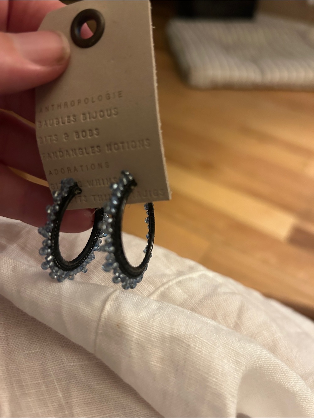 Anthropologie Black Hoop Earrings with Pale Blue Beads
